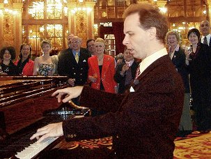 Colman playing at Le Grand Hotel, Paris