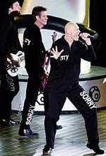 Midnight Oil performing at the closing ceremonies of the Sydney 2000 Olympic games